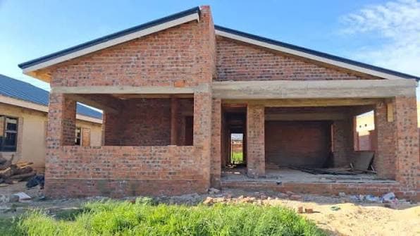A face-brick house at roof level with a covered verandah